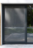 Moskitiera przesuwna jednoskrzydłowa na okno/drzwi tarasowe przesuwne